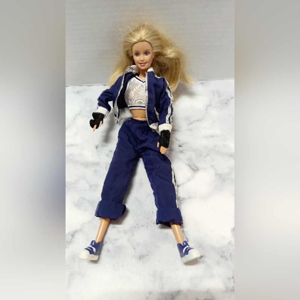 Barbie doll with the jumpsuit gloves and sneakers articulating vintage 1993